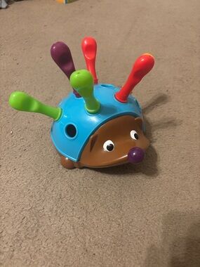 5 for $25Blue Hedgehog Peg Sorting Toy with Multicolor Pegs